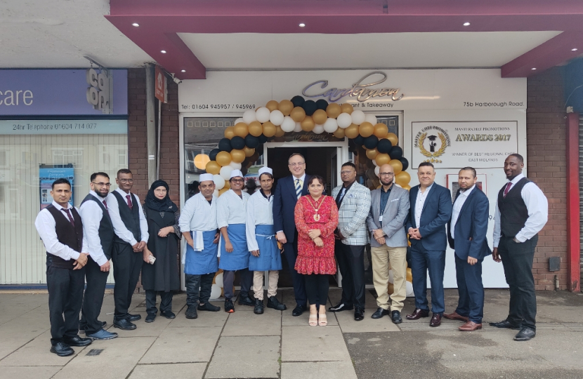 (Photo above: Michael Ellis MP, with then Mayor Rufia Ashraf and the staff of the newly opened Cardamon Restaurant in Kingsthorpe, Northampton)