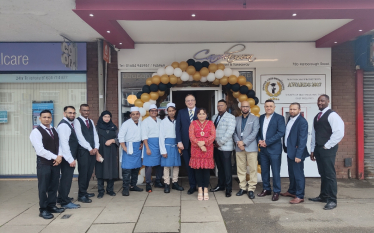 (Photo above: Michael Ellis MP, with then Mayor Rufia Ashraf and the staff of the newly opened Cardamon Restaurant in Kingsthorpe, Northampton)